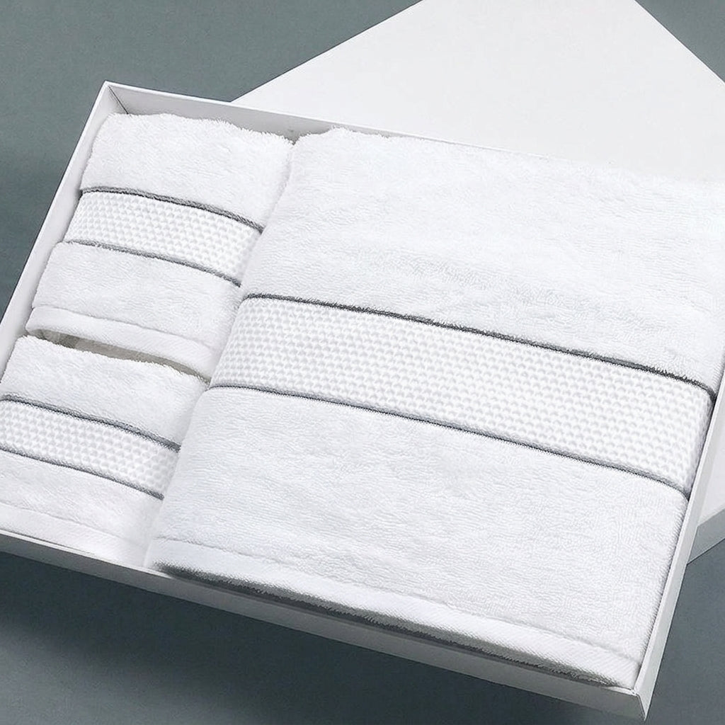 Atelier white cotton bath and hand towel set presented in a clean white gift box