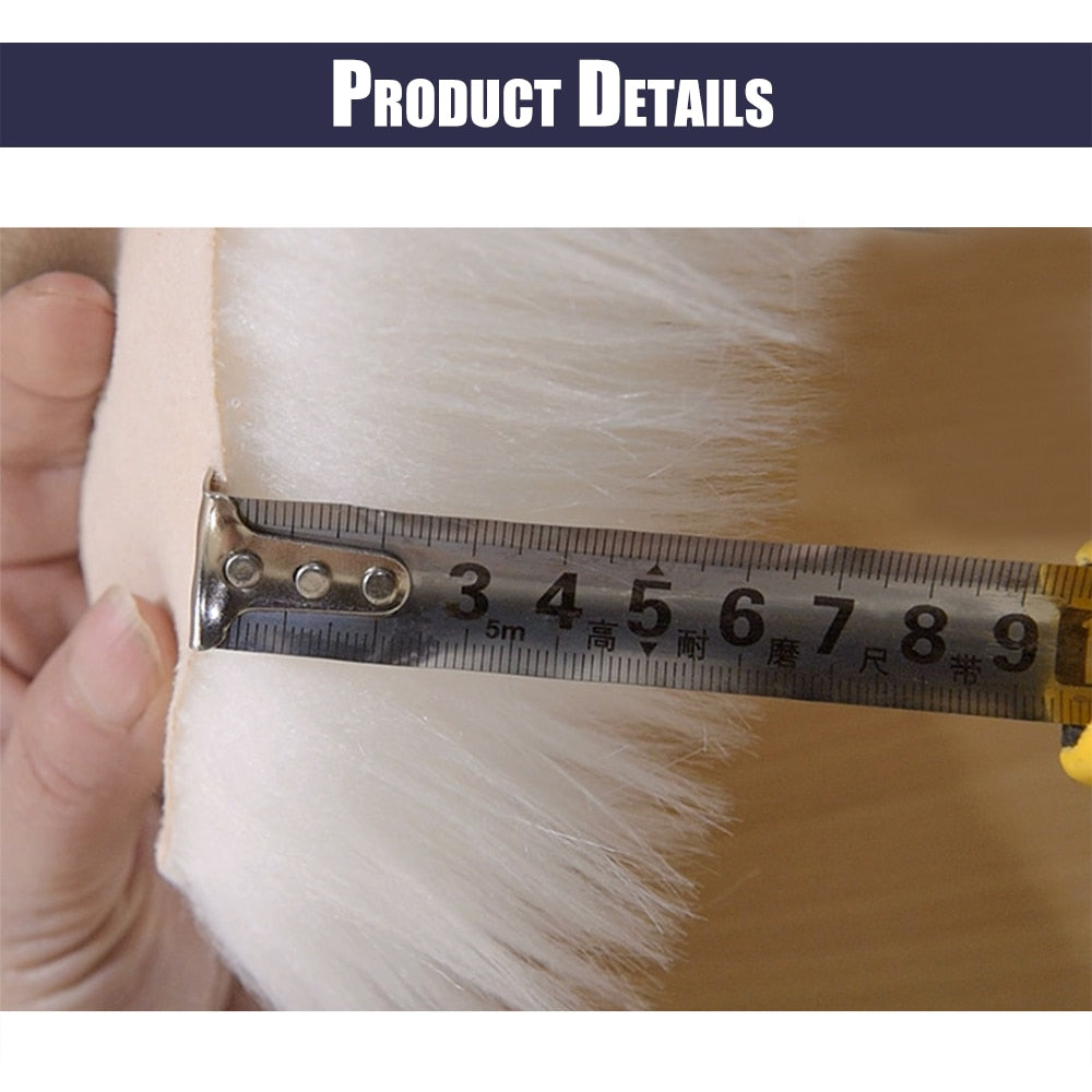 Ruler measuring pile height of Birino faux sheepskin heart shaped rug, showing deep fluffy acrylic fibres