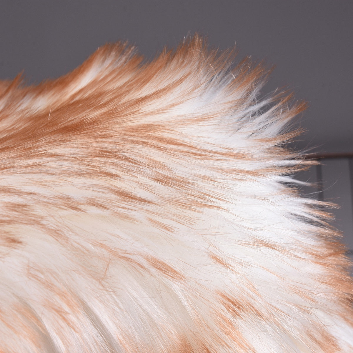 Close-up of Birino faux sheepskin rug pile in champagne, ultra-soft fluffy acrylic fibres detail