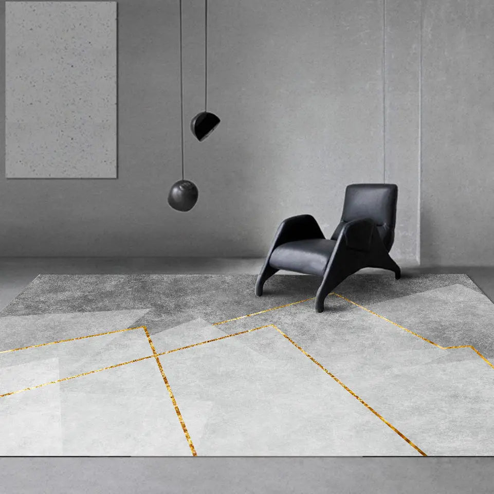 Mocco grey rug defining zones in an open-plan living area setting