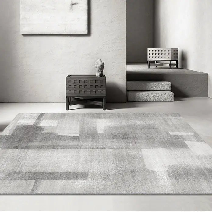 Mocco grey rug defining zones in an open-plan living area