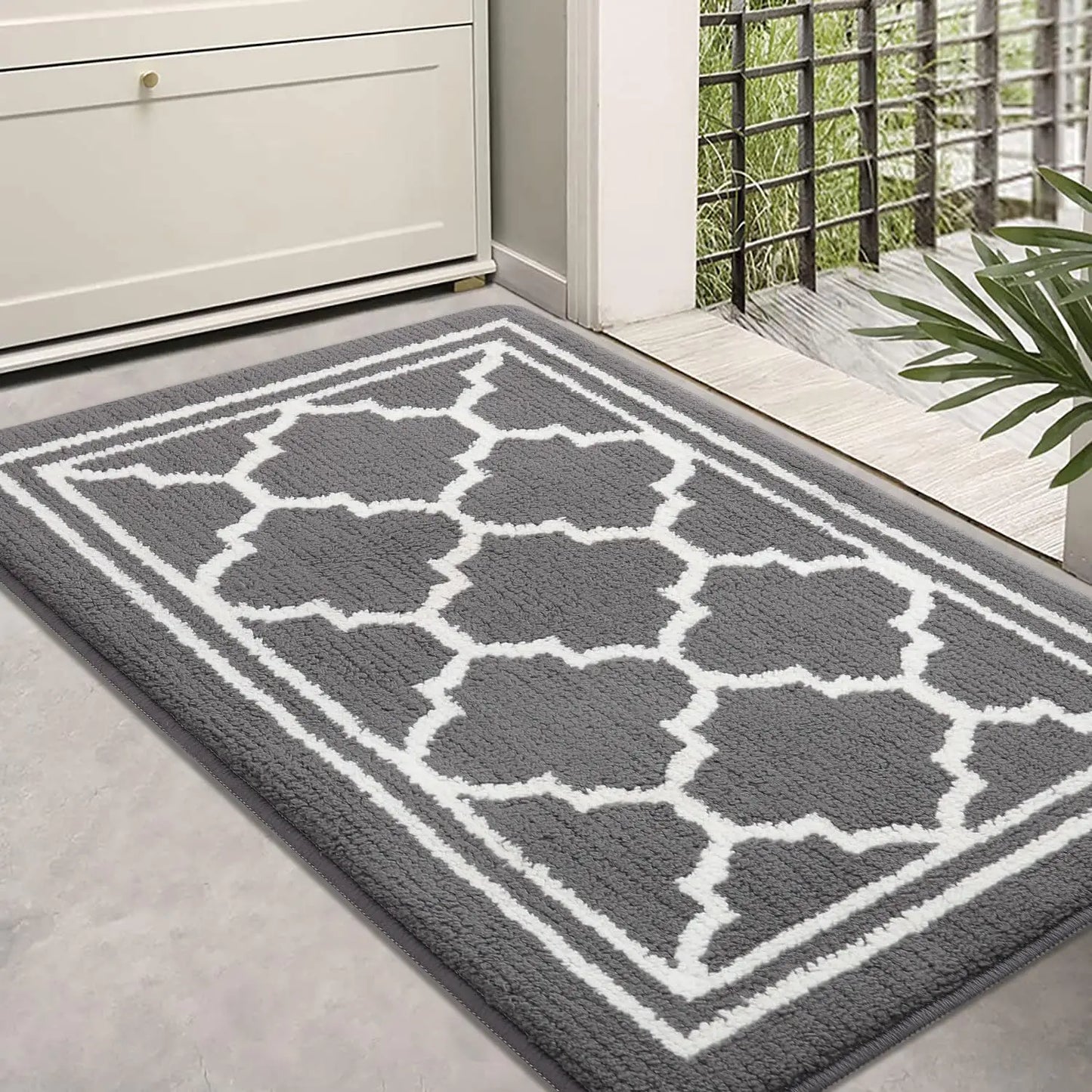 Gray Retika absorbent entrance rug in modern hallway interior