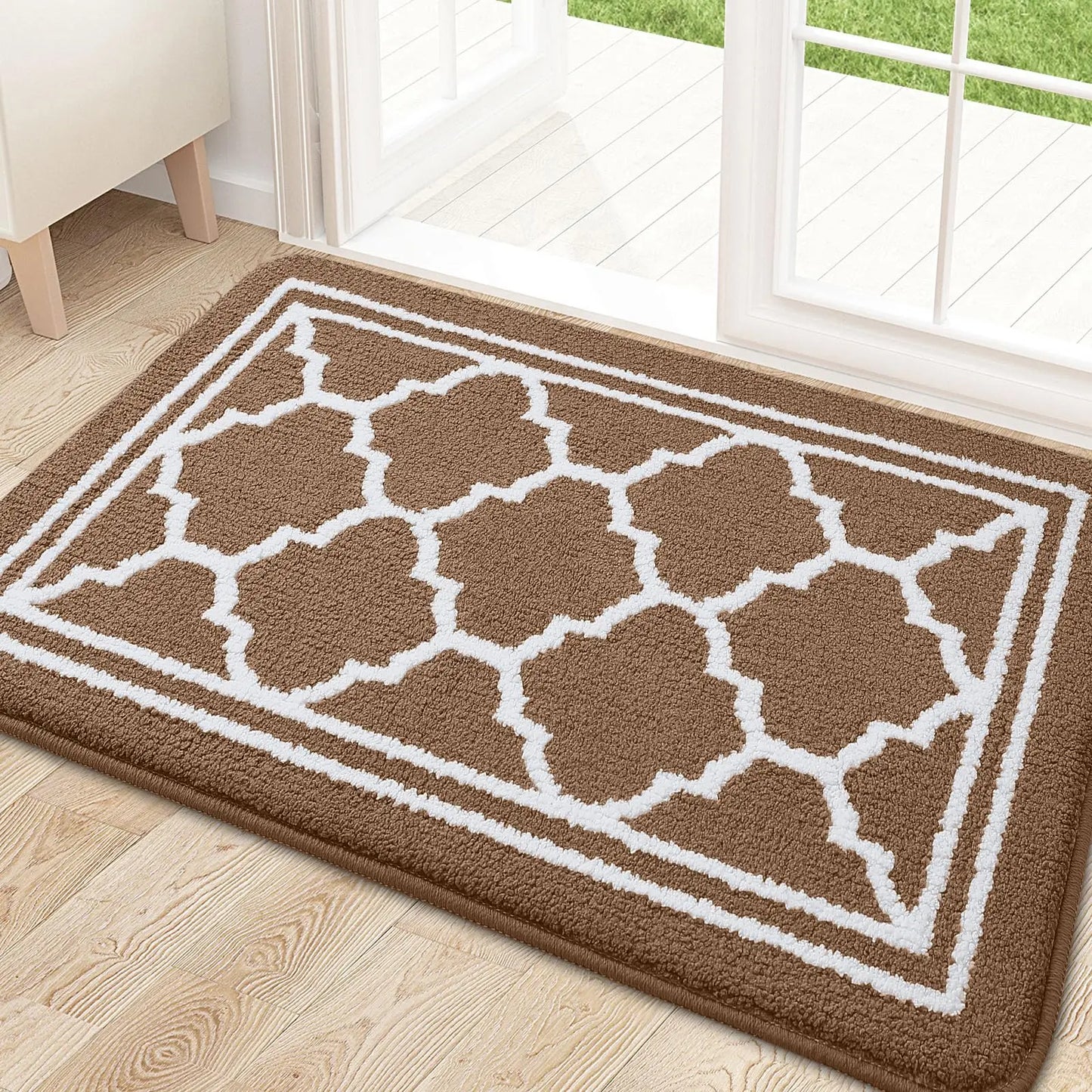 Light brown Retika absorbent entrance rug in modern hallway interior