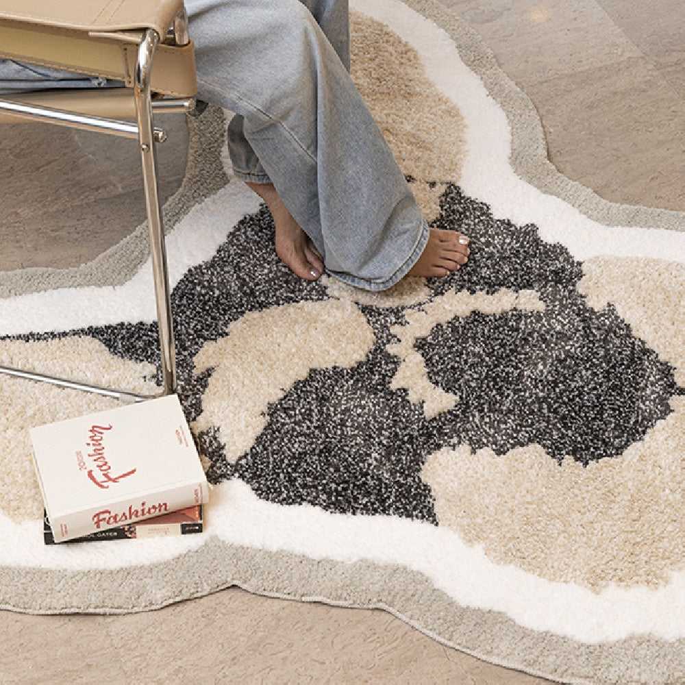 Person standing barefoot on Schnauzer shaped animal print rug showing soft plush texture